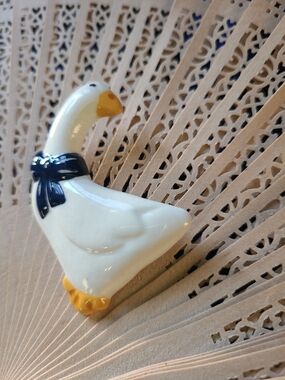 Hand Crafted White Ceramic Goose Brooch with Navy Bow and Yellow Beak